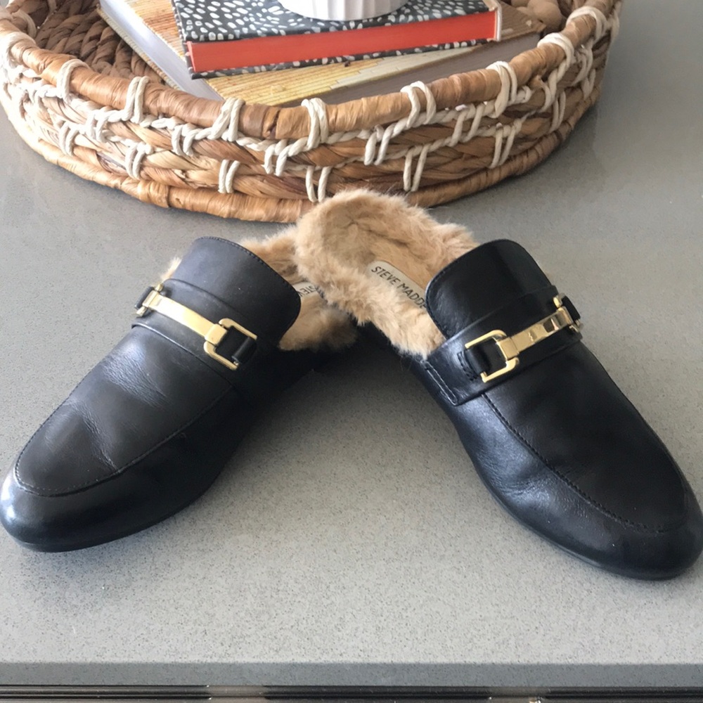 Super cute mules with faux fur detailing. Worn once. Fit more like a size 8.